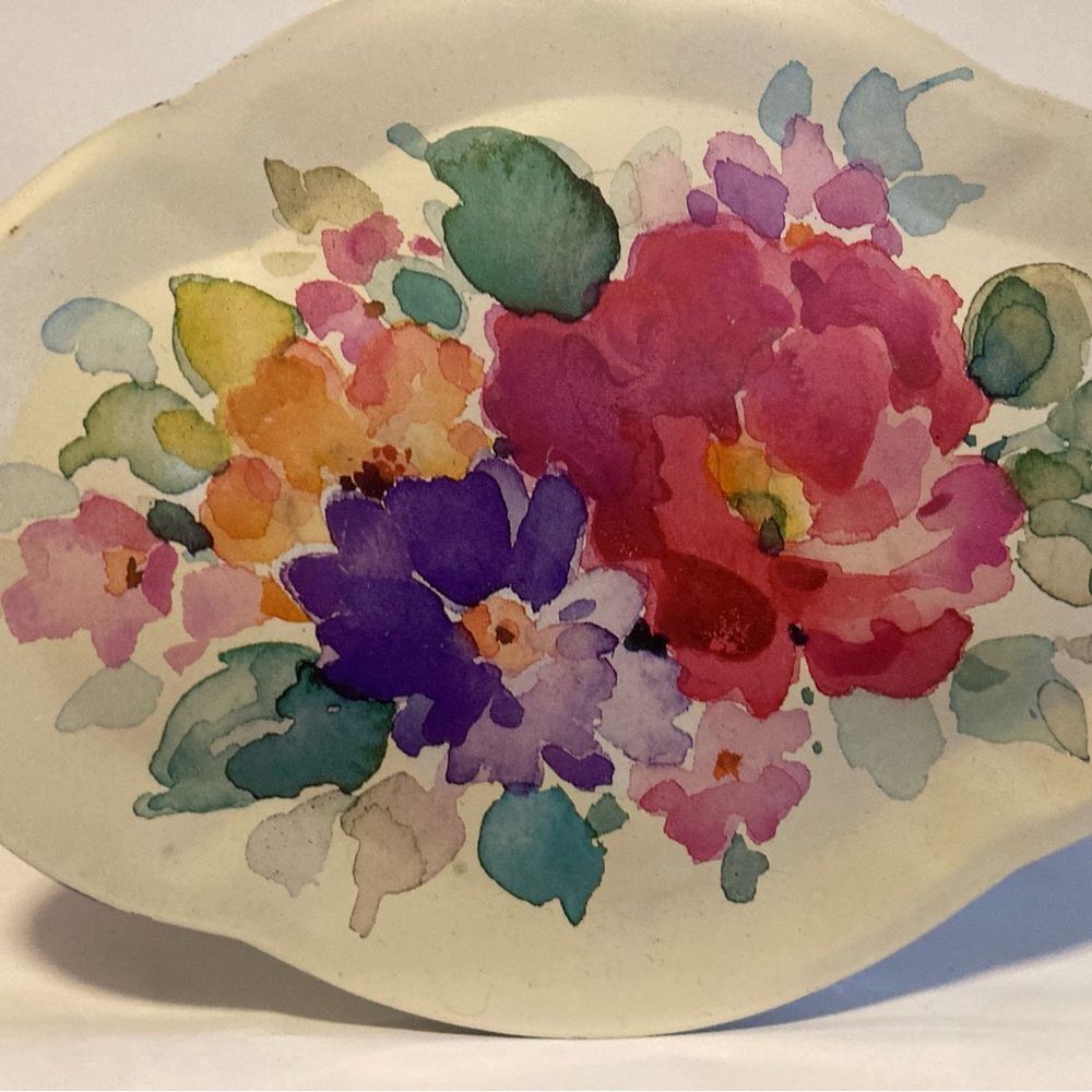 Floral tin.  Made in England.